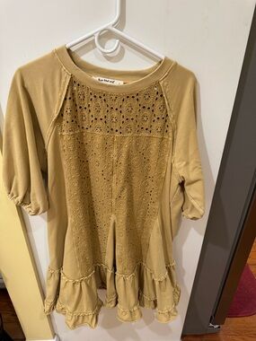 Three Bird Nest Mustard Eyelet Front Ruffle Hem Tunic